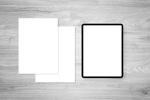 A4 Paper and Tablet Mockup Clean Workspace