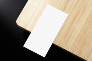 DL Paper Mockup on Wood Background