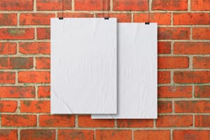 Hanging Poster on Brick Wall Mockup