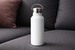 Water Bottle Mockup on Sofa