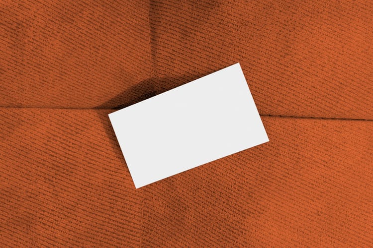 Business Card Mockup on Fabric Sofa