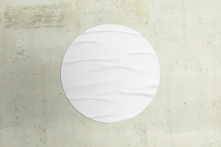 Round Paper Poster on Concrete Wall Mockup