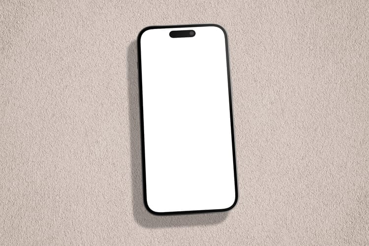 iPhone Mockup on Wall Background Texture