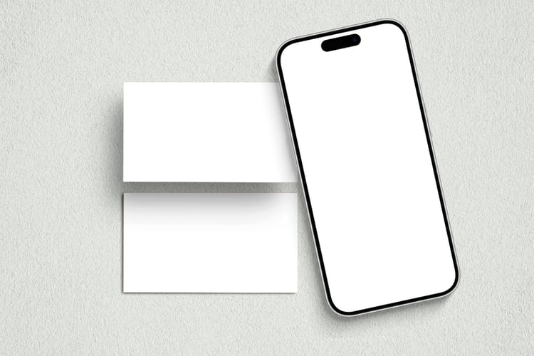 iPhone With Business Card Mockup on Wall Texture Background